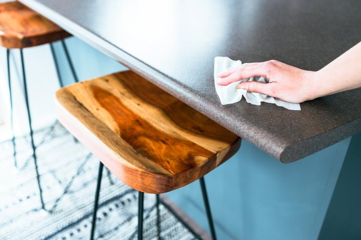 Ethanol being used to clean work surface.